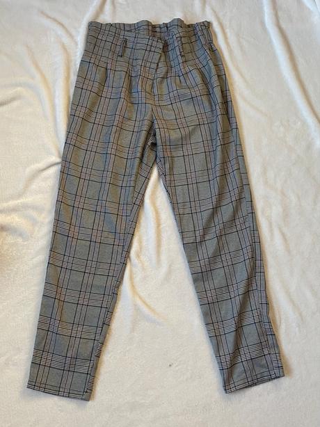 Kárované nohavice, 44