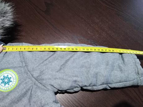 Šedá bundička, 86