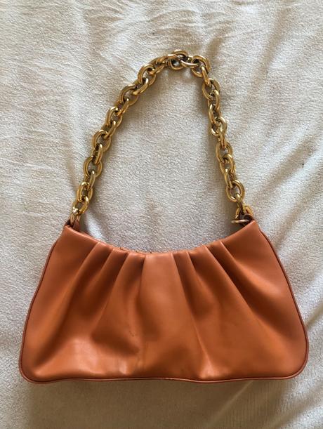 Oranžová kabelka do ruky,