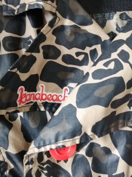 Trenckot so zvierací vzorom, 36