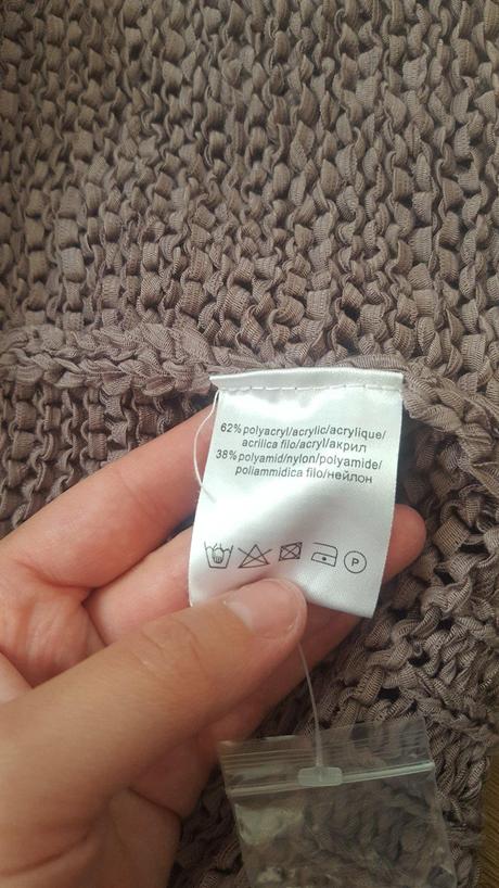 Šedofialový sveter, 42