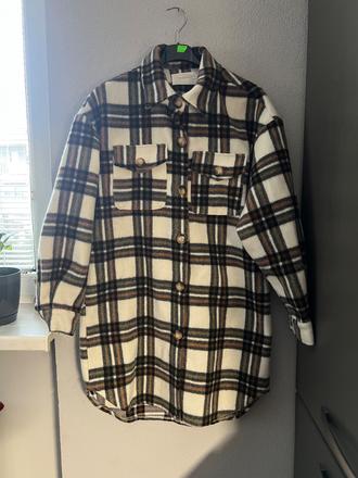 Predĺžena hrubšia košela, s