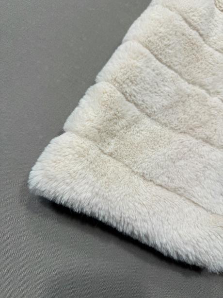 Kožušinová vestička, 134