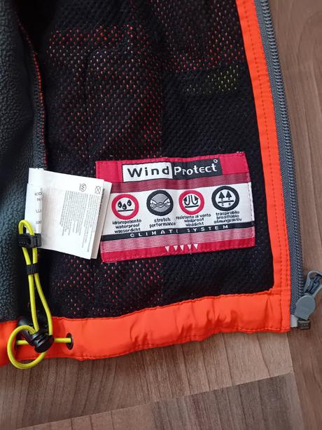 Kvalitna sportova vetruodolna vesticka, cmp,98