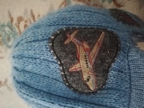 Teplučká čiapka, 128