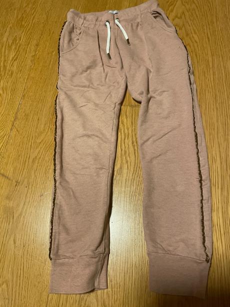 Tepláky s lesklým lemovaním, 140