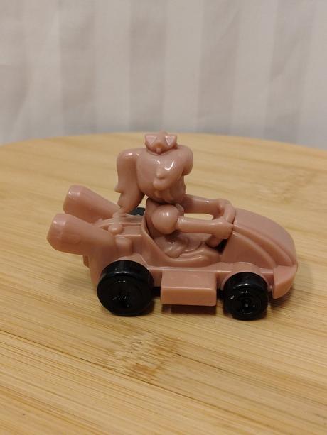 Zberateľs merch autíčko pink gold peach mario kart,