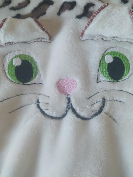 Mačičkový overal, 56