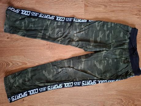 Zateplené maskáčové nohavice v.122, 122