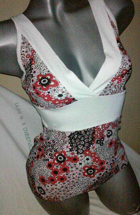 Kvetovany natelnik, s