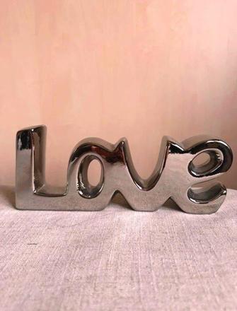 Strieborný nápis love, 