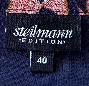 Šaty s volánmi, 40