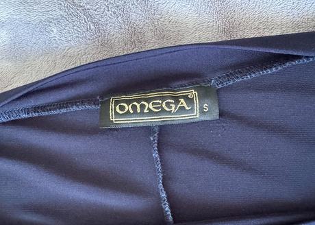 Omega modré šaty s netopierími rukávmi, s