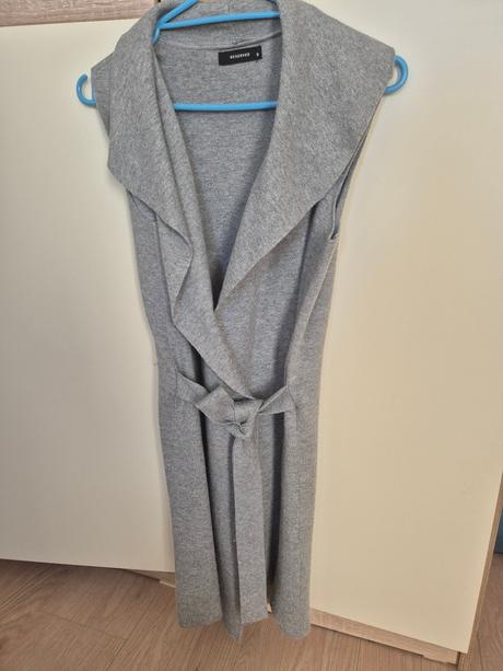 Predlzena vesta, reserved,s