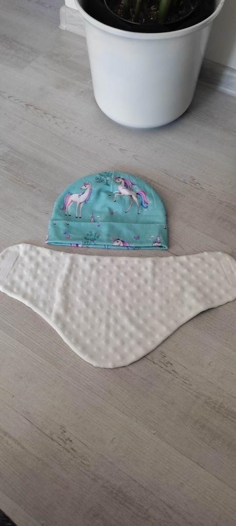 Čiapka a nákrčník, 134