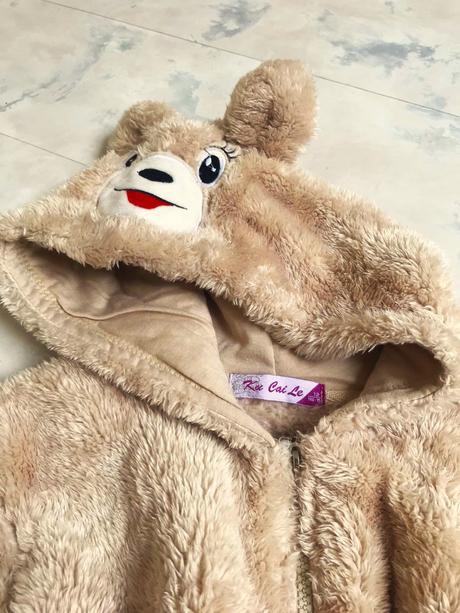 Teplá huňatá bundička 146/152, 146