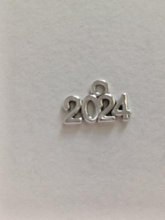 Kovový komponent 2024,