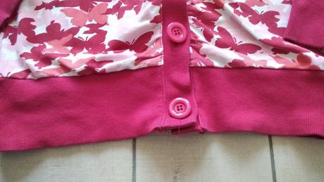 Mikina s motýlmi, 158