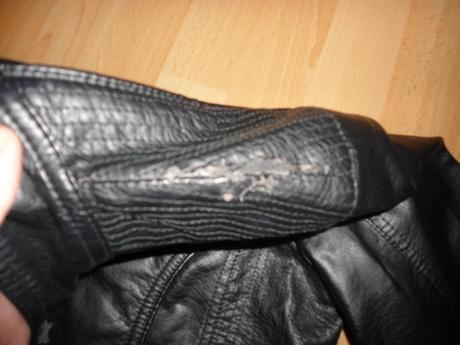 Cierna kozenkova bunda, 176