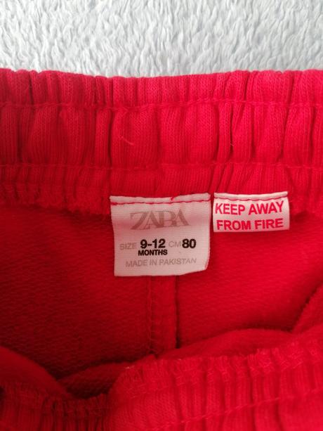 Červené teplaciky, zara,80