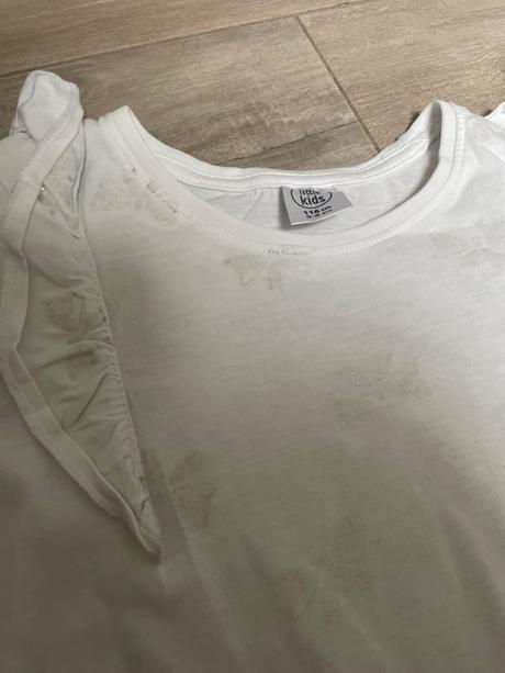 Tričko so striebornými motýlikmi, 116