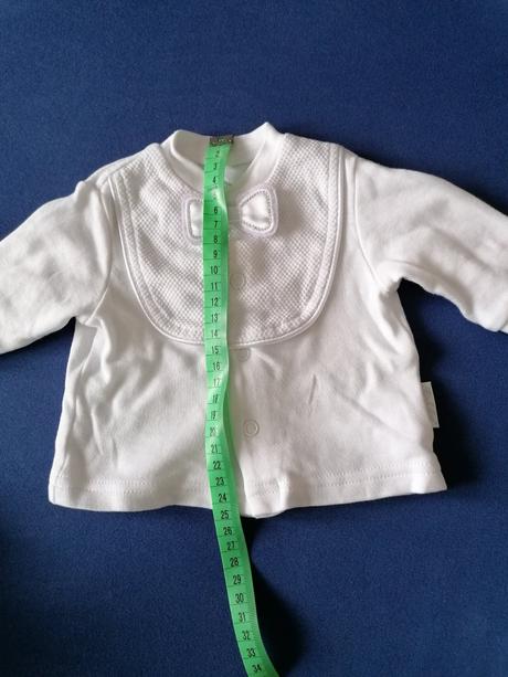 Oblečenie na krst, 56