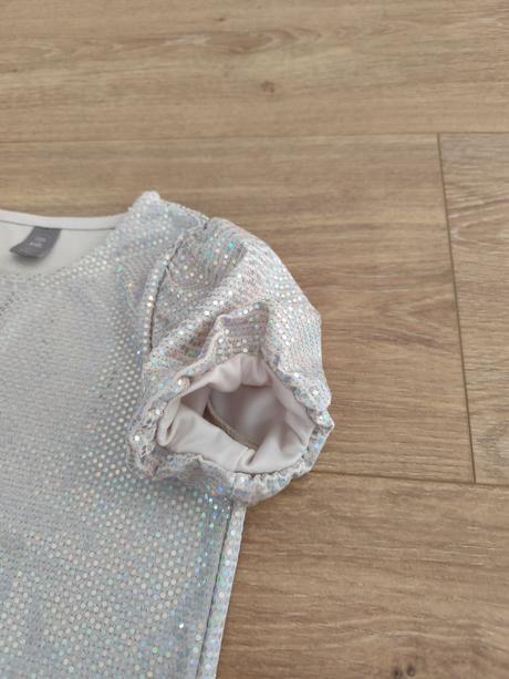 Trblietavý top, 134