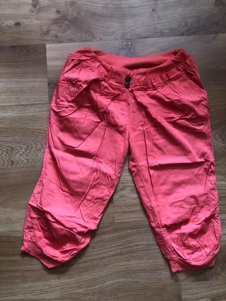 Tristvrtove nohavice, l