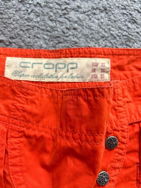 Nohavice oranžové, s