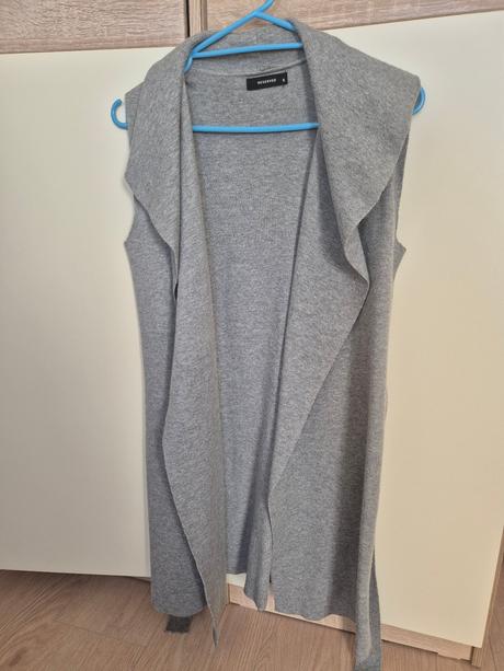 Predlzena vesta, reserved,s