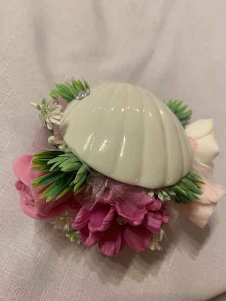 Mydlova kytica v mušli, 