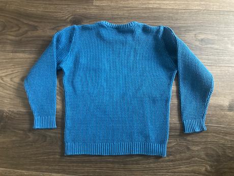 Sveter s vreckom, 116