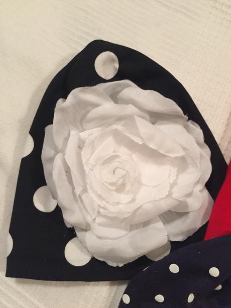 Jarné čiapky s kvetom, 92