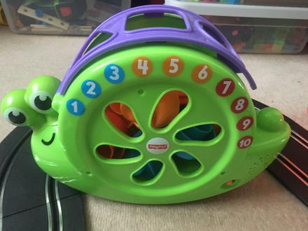Fisherprice slimák vkladačka,