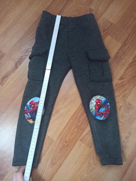 Kapsačove teplaky, 98