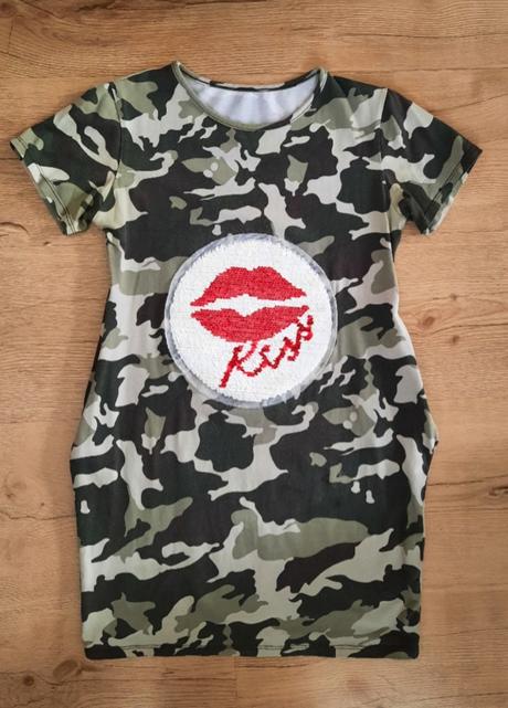 Šaty s vreckami, 122