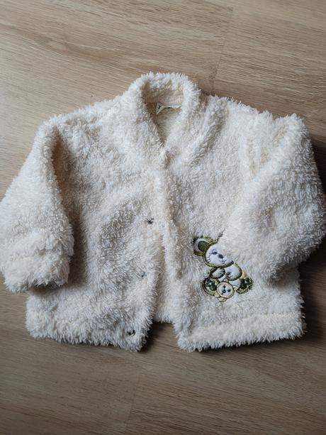 Zateplene svetriky, 56