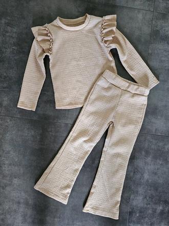 Komplet s volánikom, 116