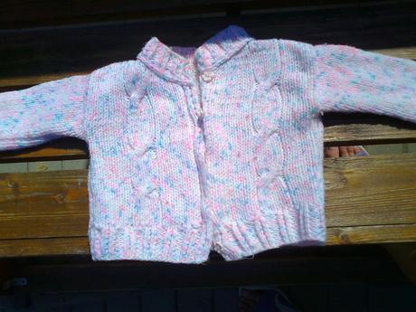 Sveter s čiapkou, 62