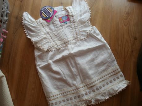 Bluzka znackova, 122