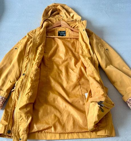 Dámska žltá bunda s kapucňou, s