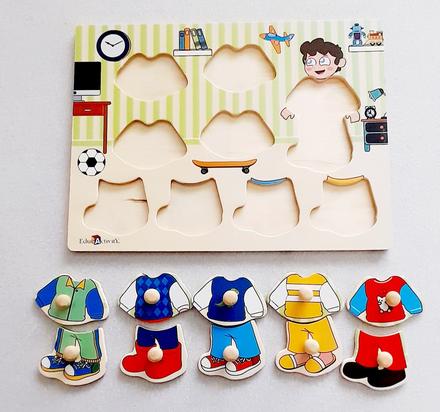 Drevené puzzle obliekačka chlapec,