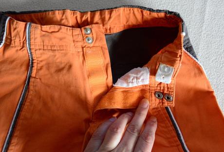 Oranžovo-sivé bermudy, 116