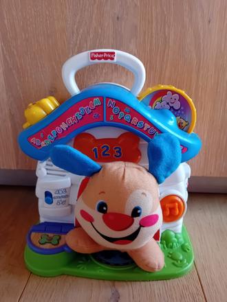 Psík s budkou od fisher price,