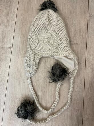 Čiapka s brmbolčekmi, 122