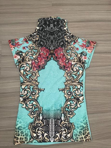 Tyrkysové tričko, 36