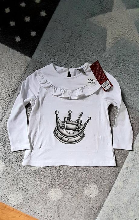 Nové tričko s korunkou, 104