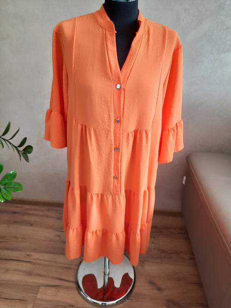 Šaty z padaveho materiálu, 