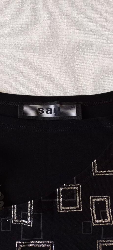 Elegentný top s trblietkami, s