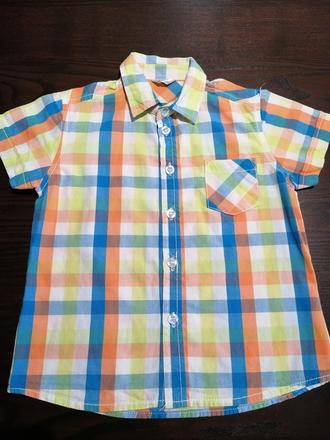 Oranzovkasta košeľa, 92